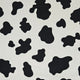 Pattern of black abstract shapes on a white background