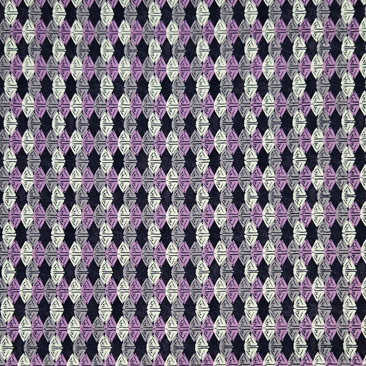 A repeating geometric pattern featuring purple, lavender, gray, and off-white diamond motifs on a dark navy background.
