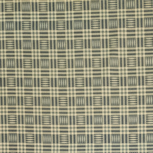A close-up of a woven fabric with a repeating plaid and basketweave pattern in beige and dark gray.