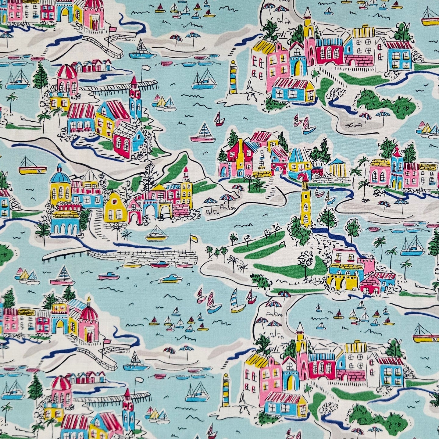 Colorful illustrated map of a coastal town with buildings, boats, and landscapes.