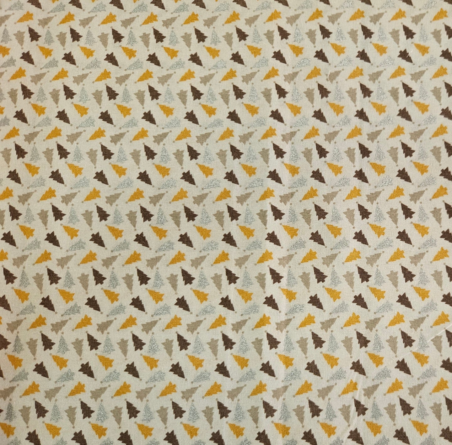 Patterned Fabric with Small Christmas Trees in Brown, Gold, Beige and Shiny Silver.